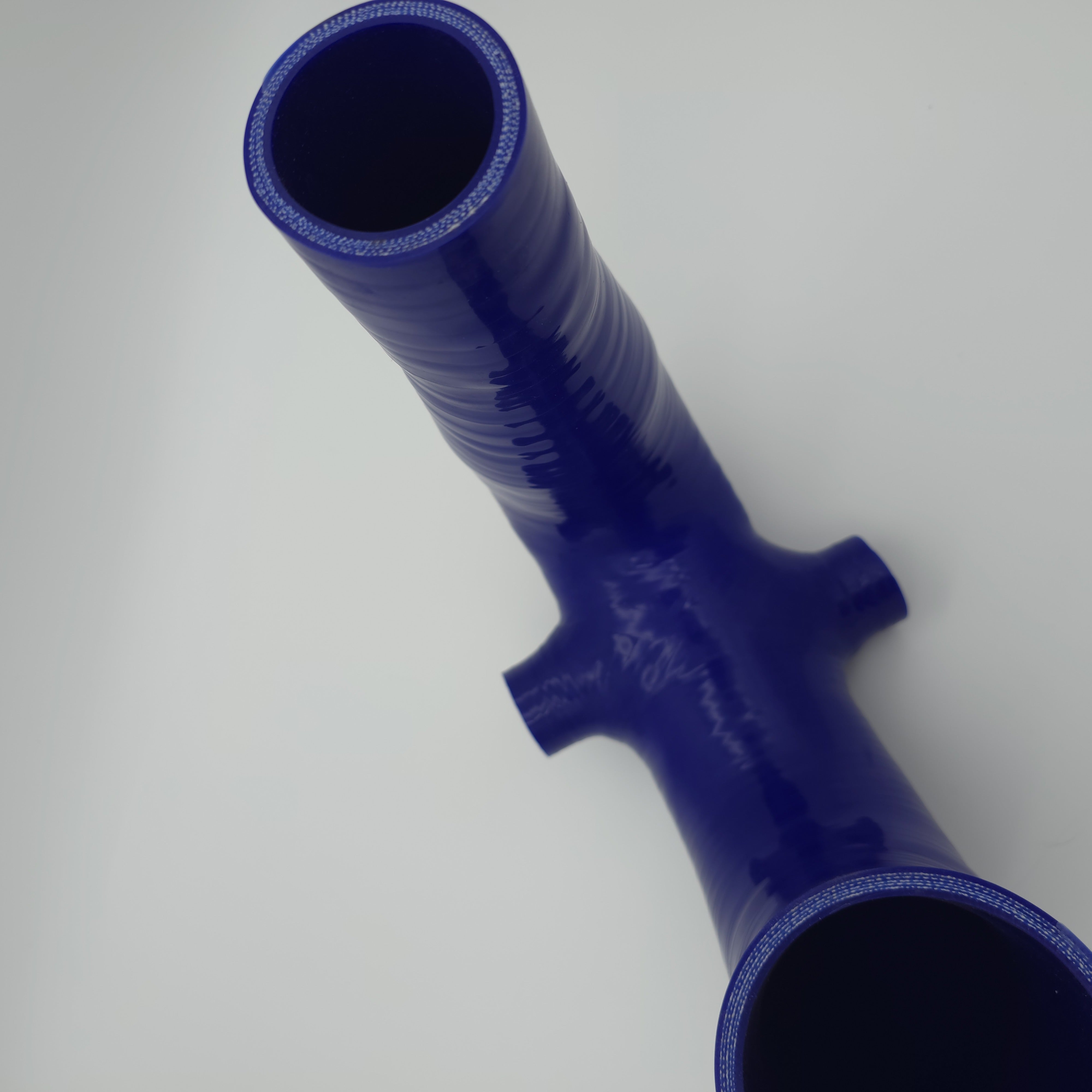 Evolution Powersports V-Flow intake tube in blue — actual item view 11