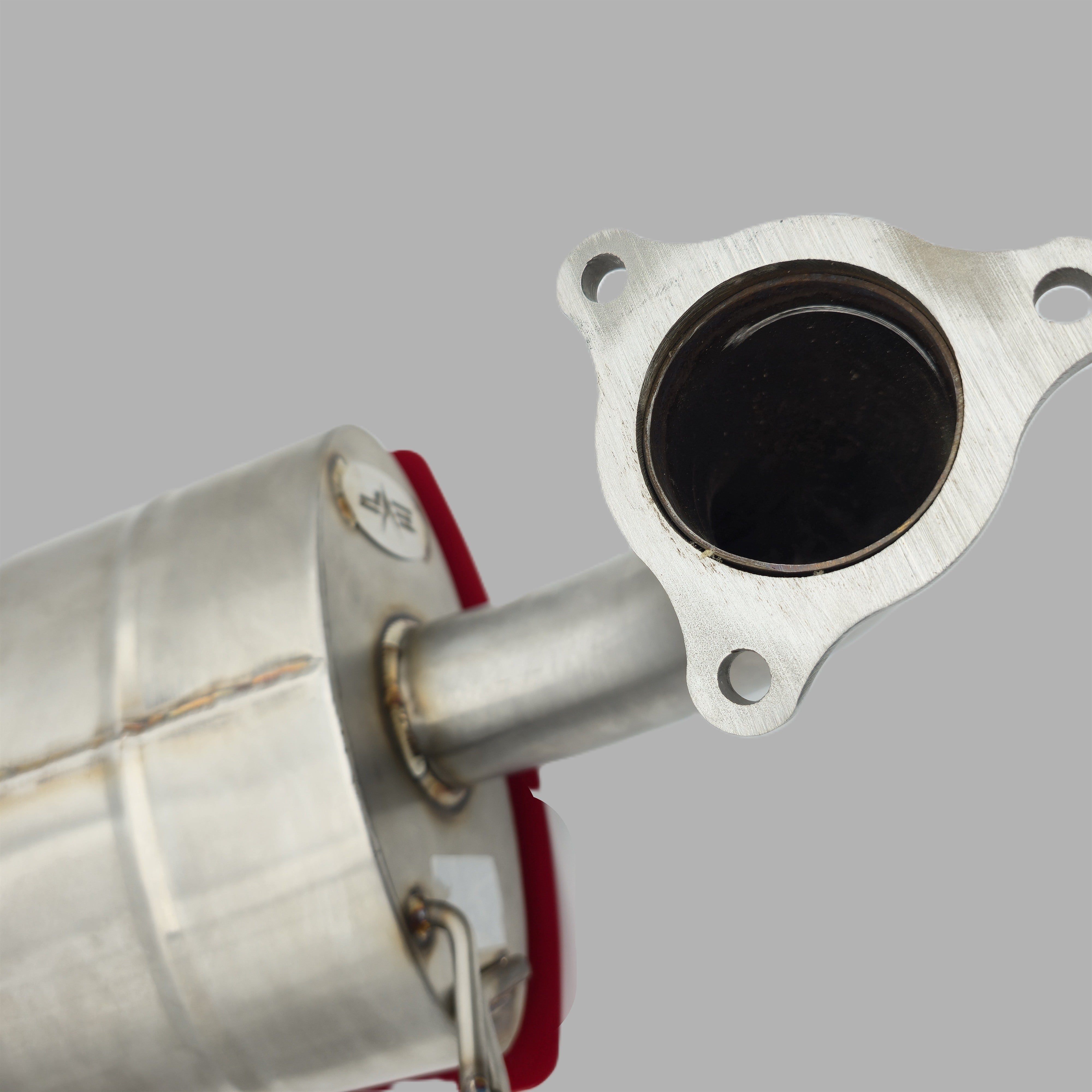 Evolution Powersports Magnum Side Exit Slip-On Exhaust with red heat shield - actual unused display unit