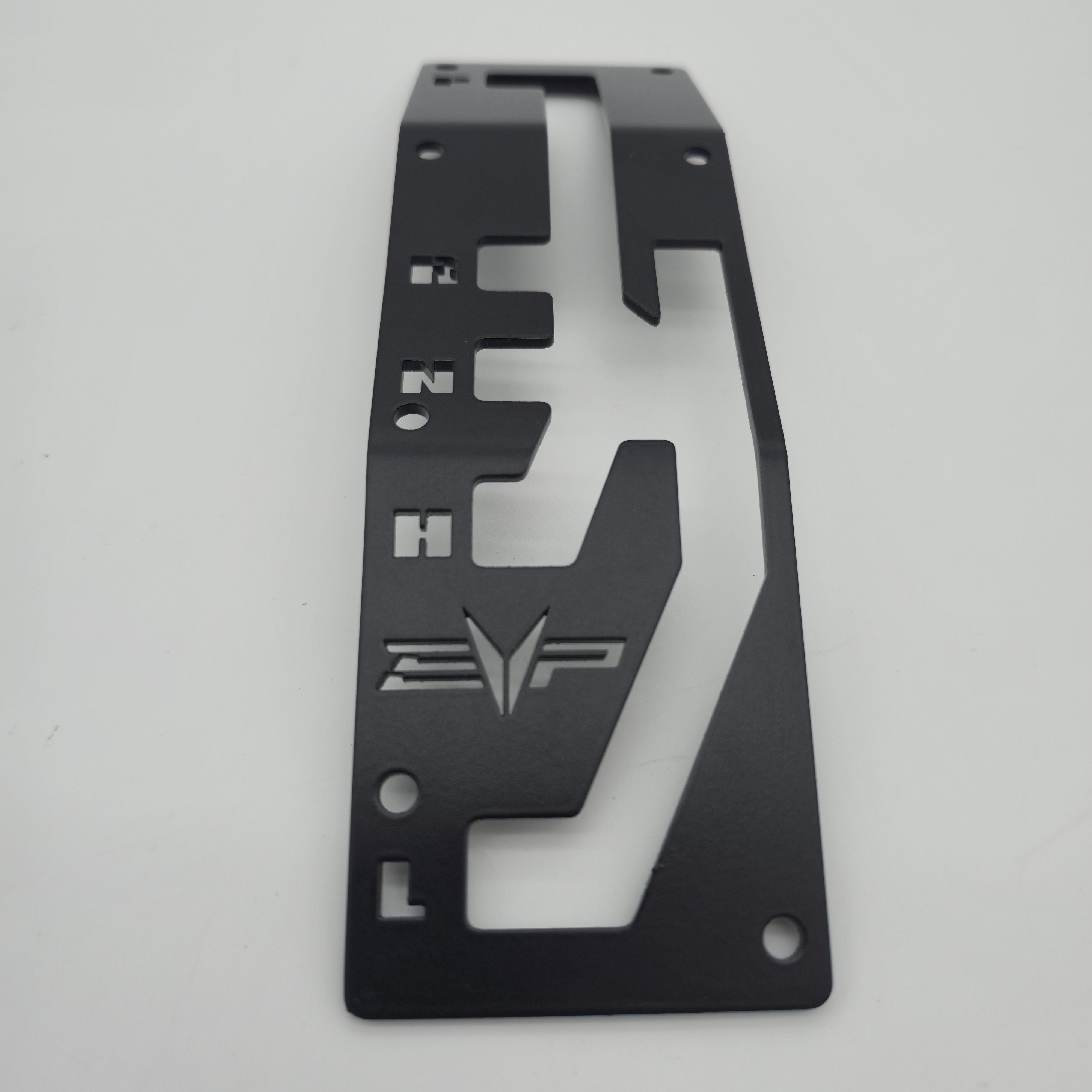 Can-Am Maverick X3 black shift gate plate — angled profile view